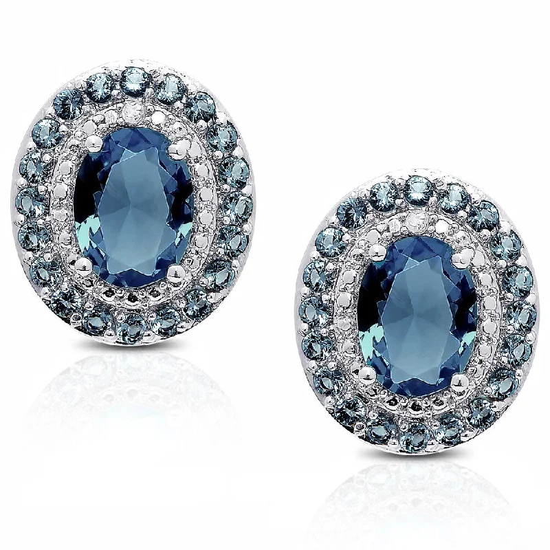 women's cubic zirconia drop earrings -Dolce Giavonna Sterling Silver London Blue Topaz Diamond Accent Oval Stud Earrings